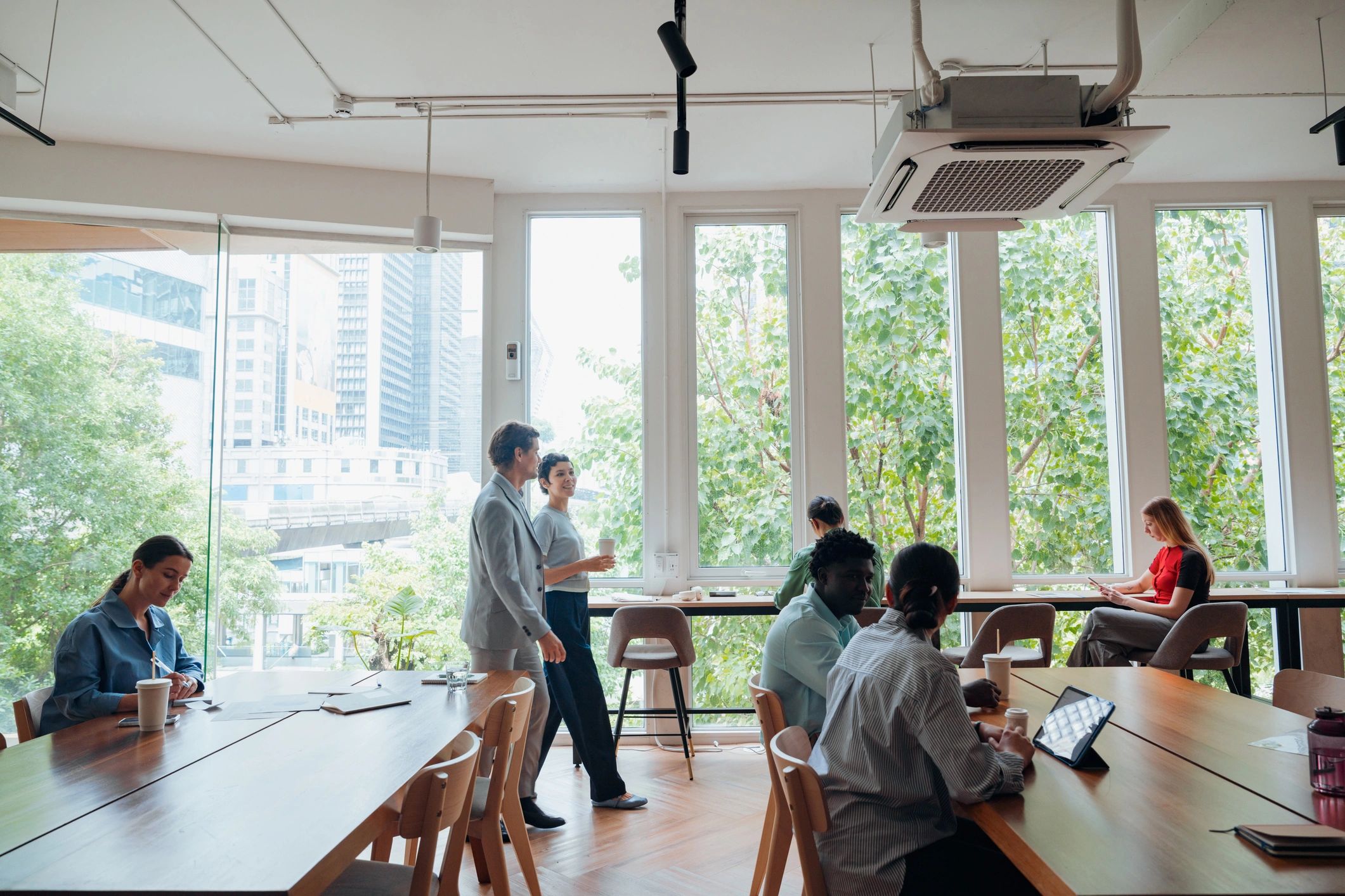Executive leadership team meeting in a modern office